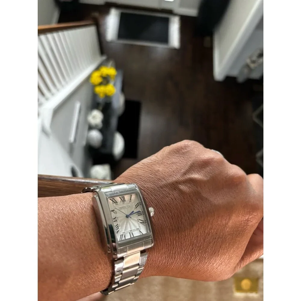 Invicta Silver Watch with Blue Hands and Roman Numerals